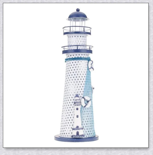 Oceanica LED Lighthouse Lantern Nightlight with nautical details like a small boat, life buoy, and seashells, providing a soft warm glow.