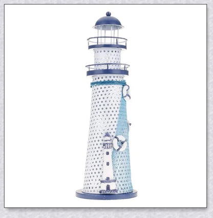 Oceanica LED Lighthouse Lantern Nightlight with nautical details like a small boat, life buoy, and seashells, providing a soft warm glow.