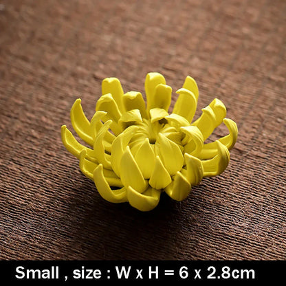 Elegant ceramic incense burner with chrysanthemum design, available in white and yellow colours and three sizes