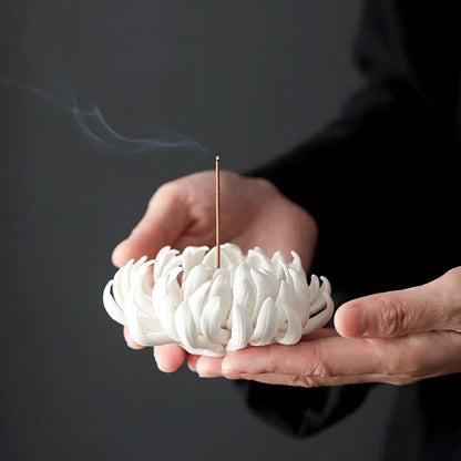Elegant ceramic incense burner with chrysanthemum design, available in white and yellow colours and three sizes