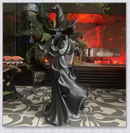 Enchanting witch's lantern decoration with a glowing light, perfect for adding magical ambiance to your home or garden