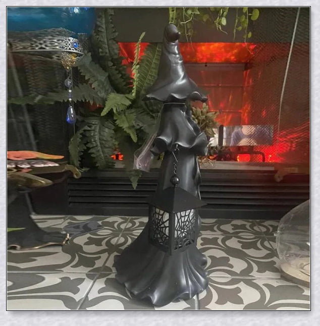 Enchanting witch's lantern decoration with a glowing light, perfect for adding magical ambiance to your home or garden
