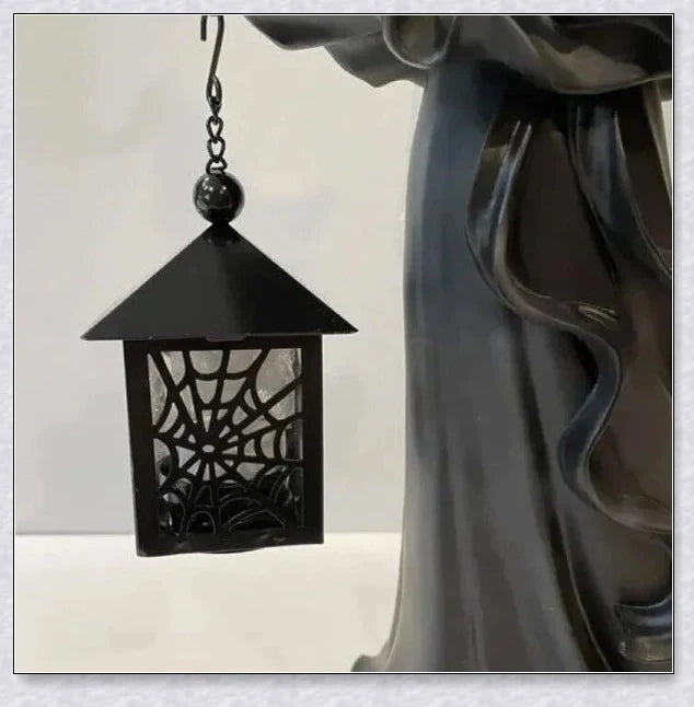 Enchanting witch's lantern decoration with a glowing light, perfect for adding magical ambiance to your home or garden