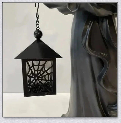 Enchanting witch's lantern decoration with a glowing light, perfect for adding magical ambiance to your home or garden