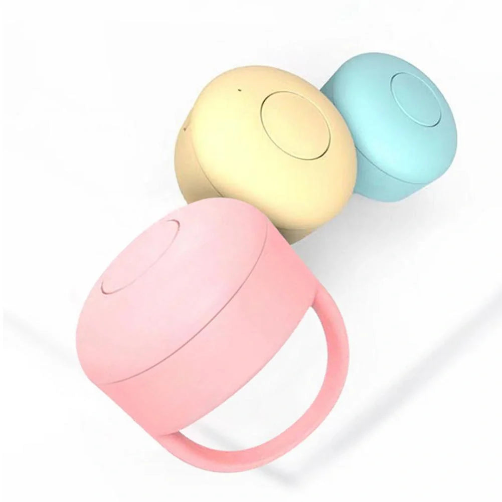 Bluetooth remote control ring for mobile phones in yellow, blue, or pink