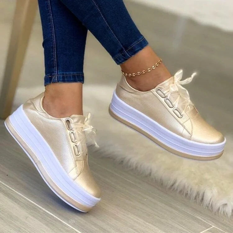 Women's ribbon lace-up platform sneakers in black, gold, silver, and rose gold
