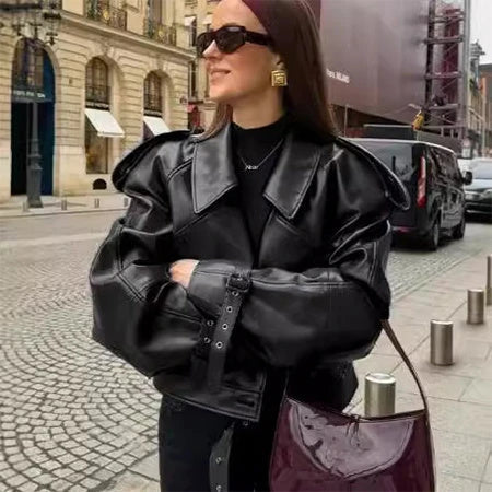 Stylish cropped leather jacket with loose lapel design, available in multiple trendy color options for fashionable streetwear