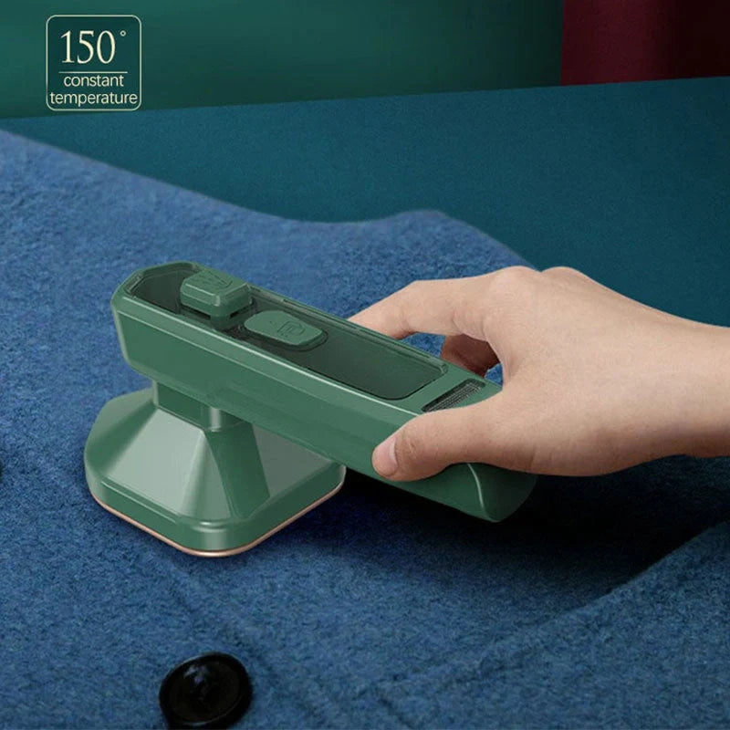 Handheld garment steamer in green, compact and lightweight for easy ironing and cleaning