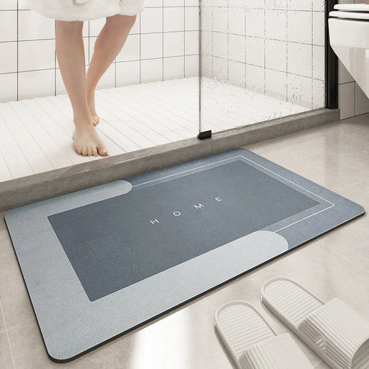 Plush, machine-woven bathroom mat with non-slip surface, available in rectangle and oval shapes in a variety of colours.