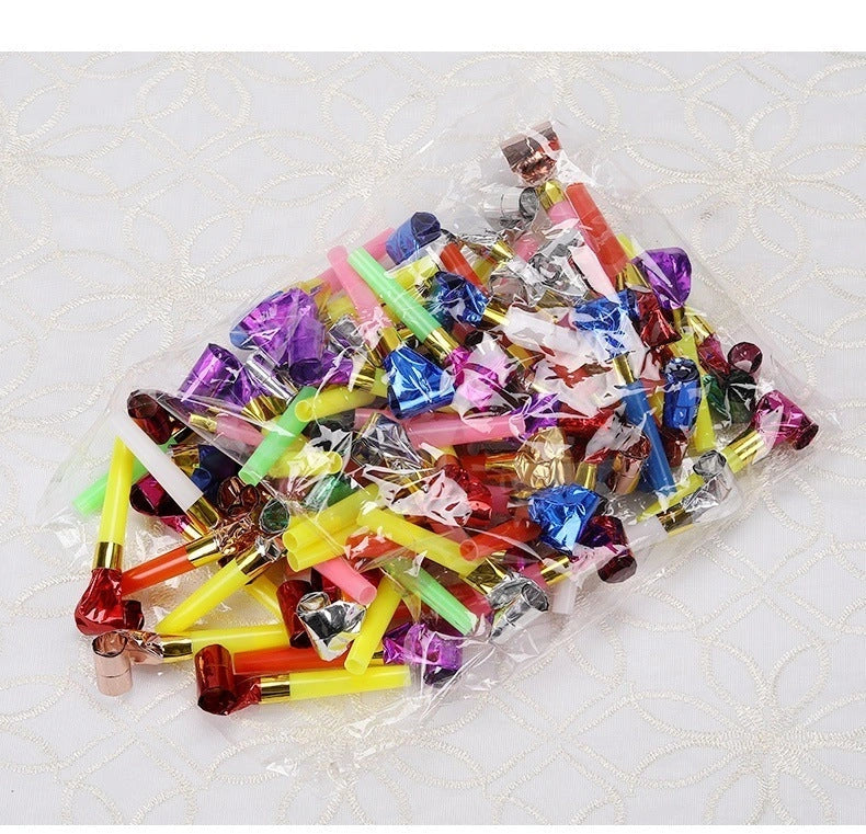 Colourful dragon-themed party favours made of high-quality plastic, including sticks and hammers in a variety of vibrant hues