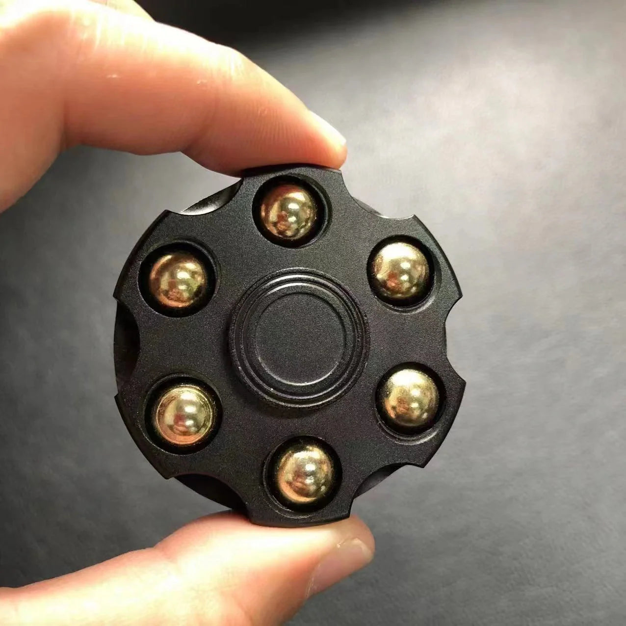 Brass gun revolver bullet fidget toy spinner with detachable rotating feature