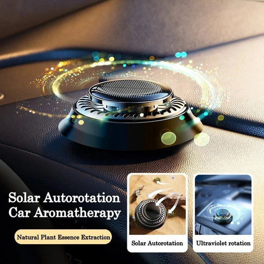 Solar-powered kinetic car air freshener with double ring rotation