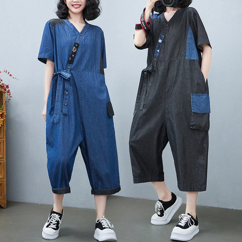 Women's denim drawstring jumpsuit with wide legs and cropped length, available in blue and black colours