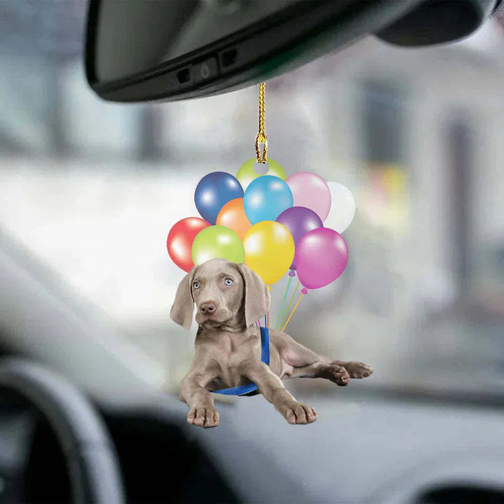 Charming cartoon dog car charm with vibrant balloon parachute design, a delightful automotive accessory for pet lovers