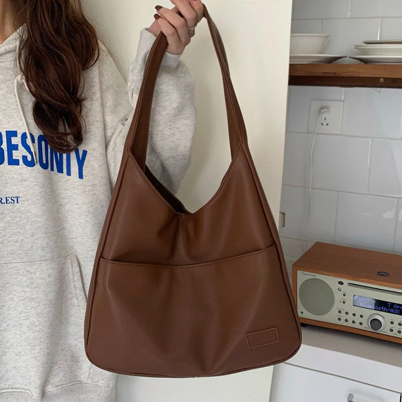 Spacious Women's Tote Bag in Brown, Black, and White Colours with Comfortable Shoulder Straps