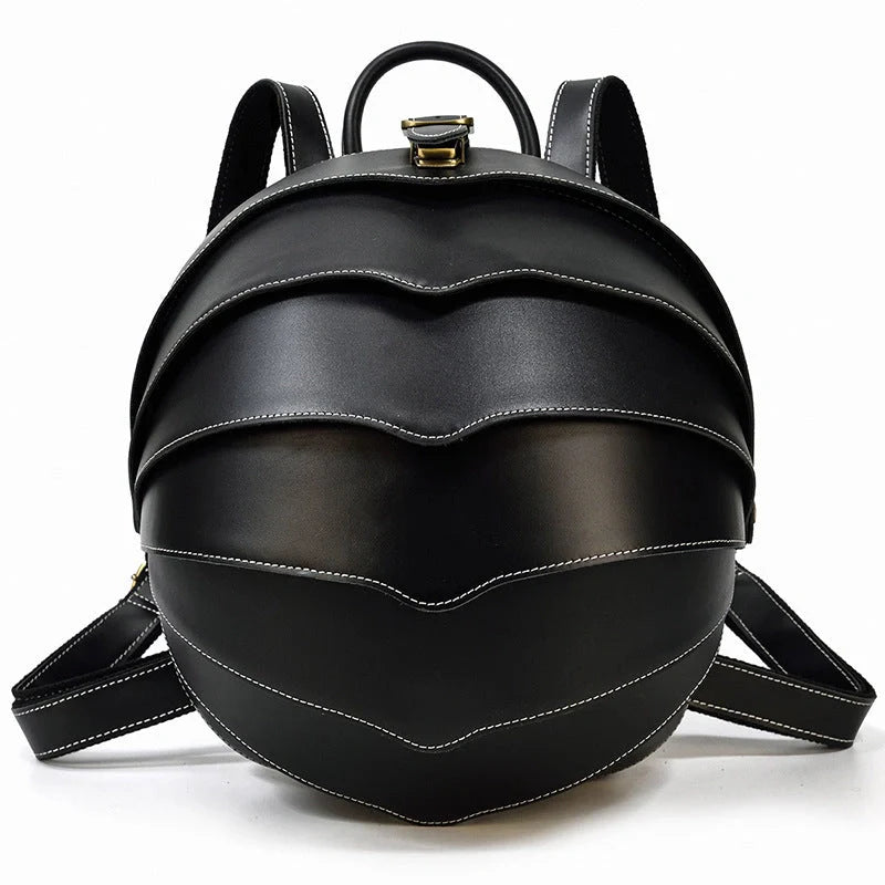 Vintage leather backpack in dark brown and black with multiple pockets