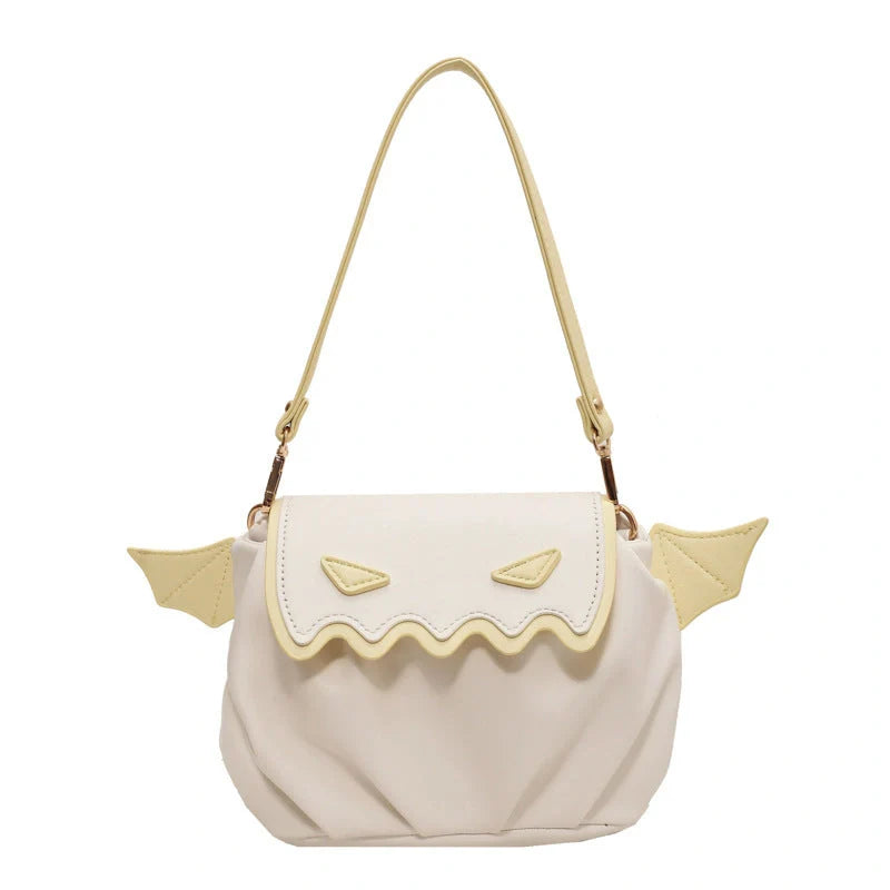 Halloween pumpkin cartoon crossbody bag with small wings in black, beige, or orange