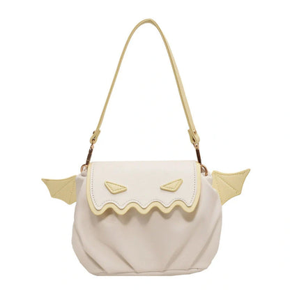 Halloween pumpkin cartoon crossbody bag with small wings in black, beige, or orange