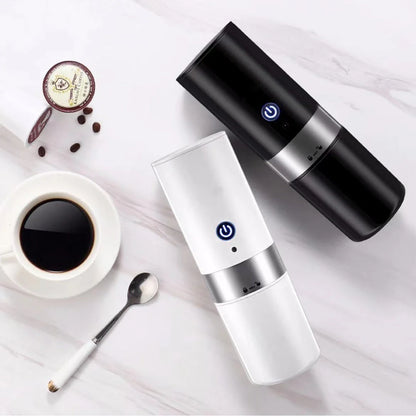 Portable automatic coffee maker with one-touch brewing and compatible with ground coffee or capsules