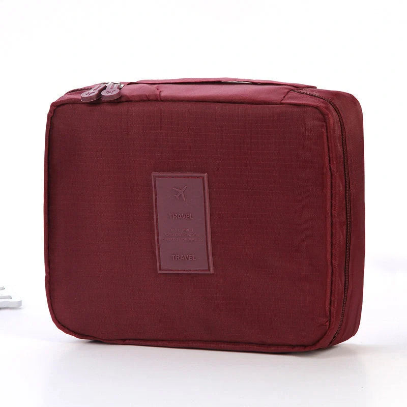 Premium toiletry bag with waterproof divider, multi-grid pockets, and durable Oxford cloth construction