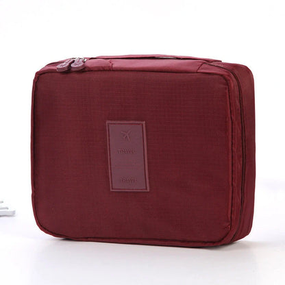 Premium toiletry bag with waterproof divider, multi-grid pockets, and durable Oxford cloth construction