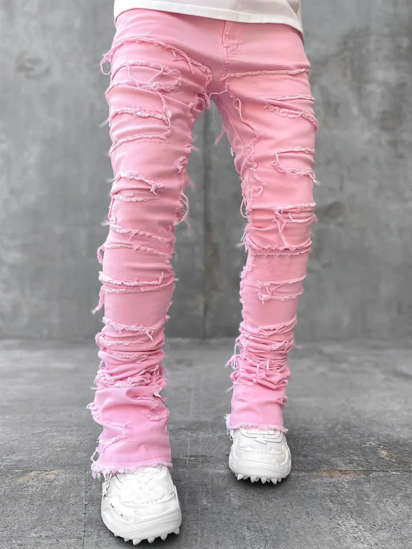 Stylish patched jeans with tight fit and stacked leg design in a variety of fashionable colors