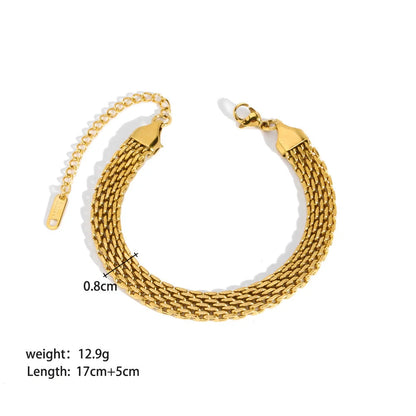 Stainless steel bracelet with real gold treatment in various colours, featuring geometry shapes and ring elements