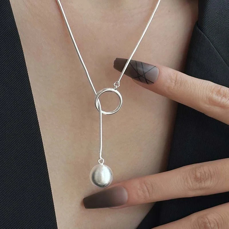 Platinum-plated round ball necklace with snake-bone chain, a versatile and elegant accessory for fashion-forward British women