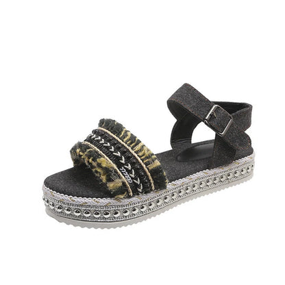 Stylish denim tassel sandals for women with thick flat sole, perfect for summer.