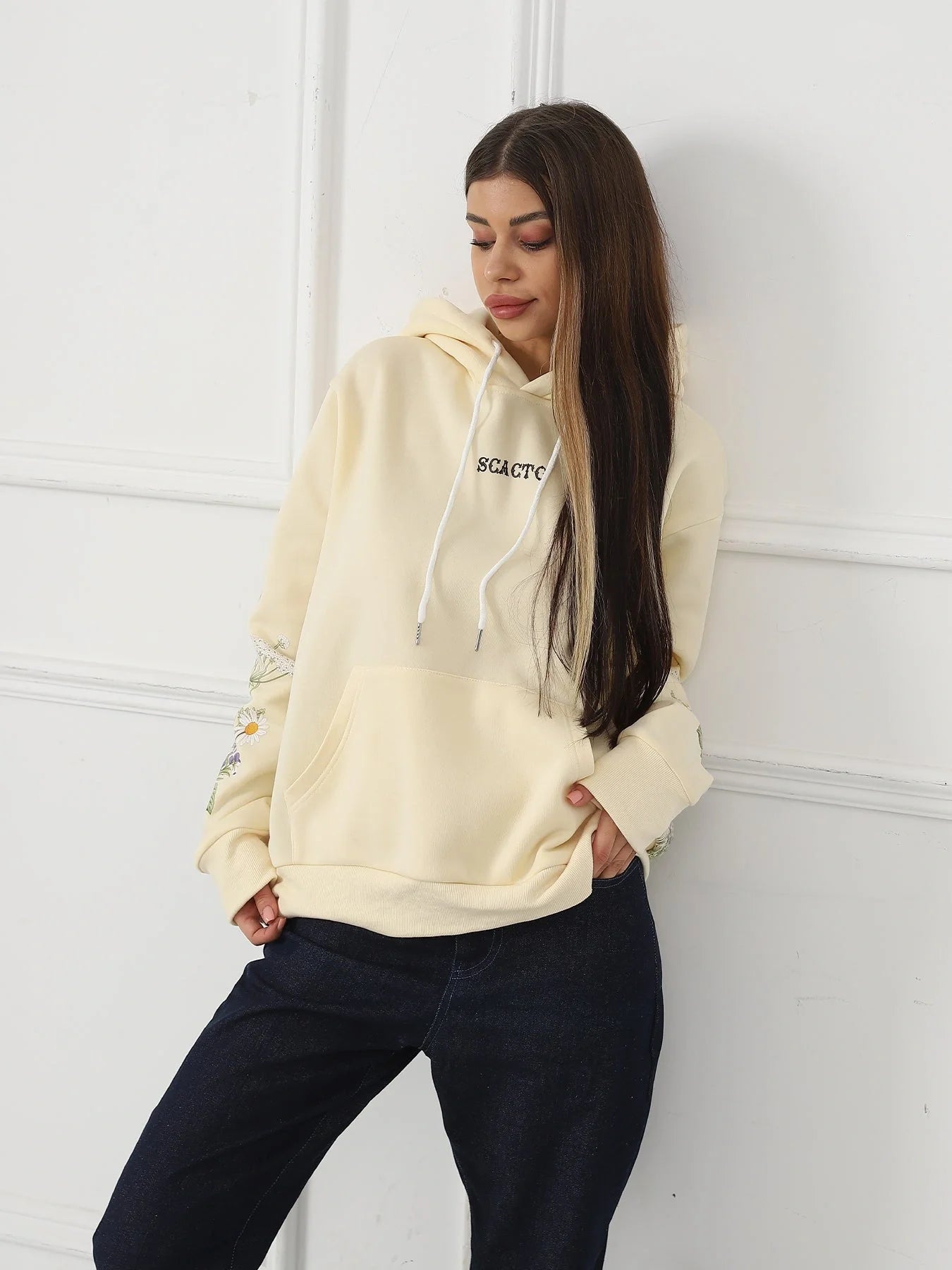 Women's floral long sleeved sweatshirt in black, blue, and apricot