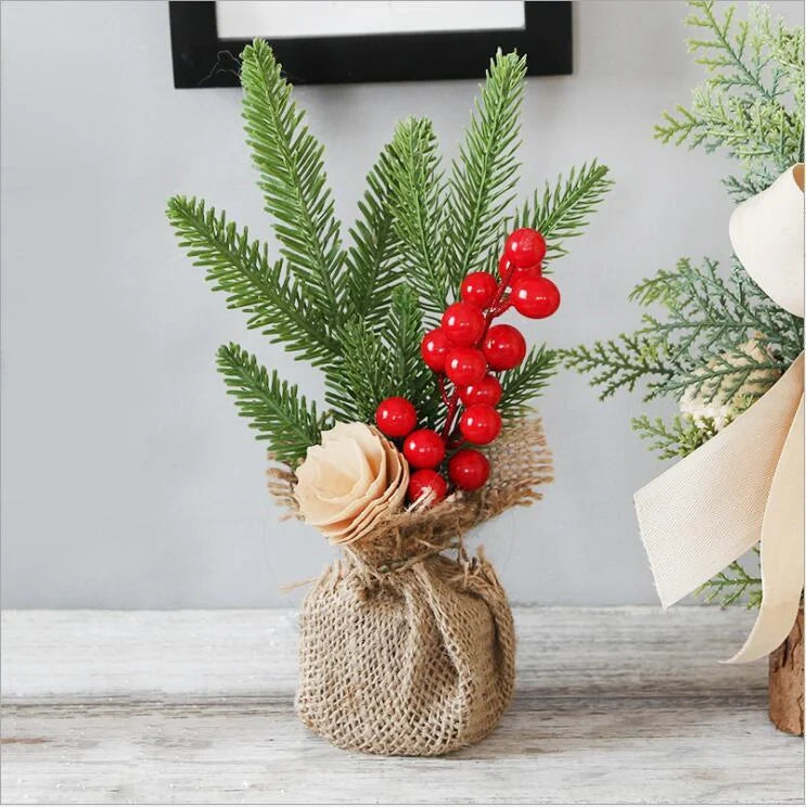 Artificial Christmas tree with red berries and flocked snow effect, 25cm in height