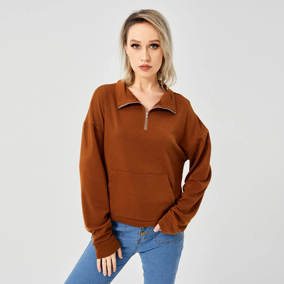 Women's pullover sweatshirt in white, grey, and brown, available in sizes S to XL
