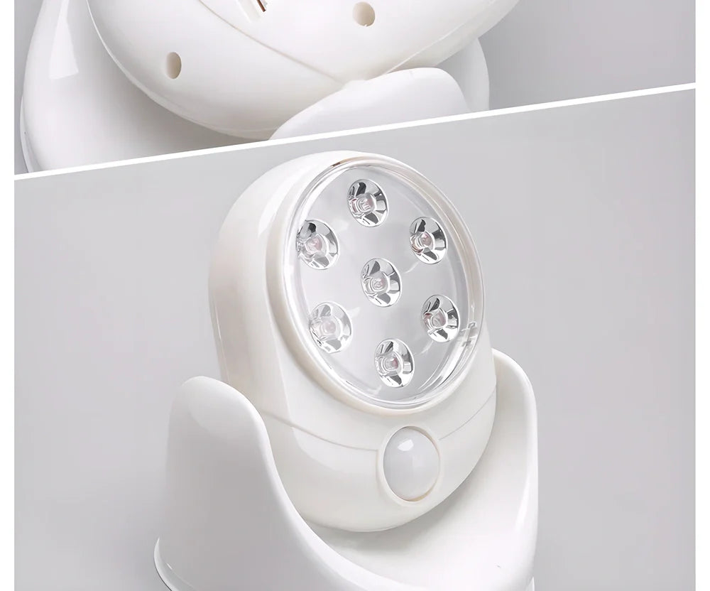 Motion-activated LED light with 360-degree rotation and adjustable tilt for versatile indoor and outdoor use