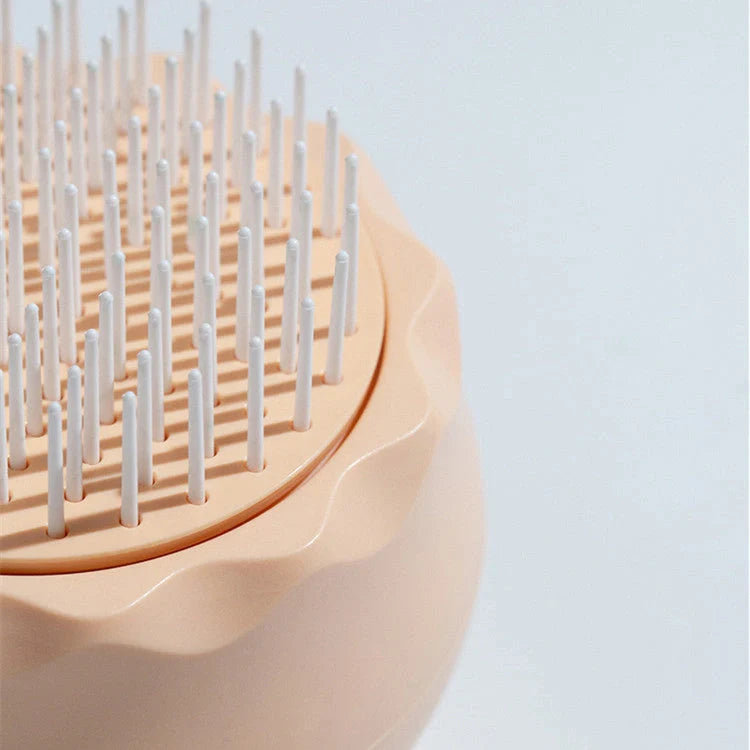 Floating Massage Pet Needle Comb for cat grooming in orange pink and baby blue