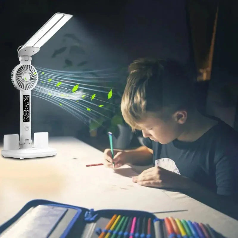 Foldable LED desk lamp with fan, thermometer, and pen holder on a tidy desk