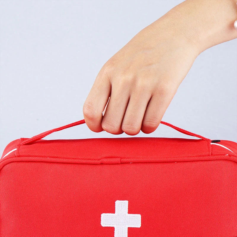 Large empty first aid kit in red, made from durable 600D Oxford cloth for outdoor and travel use