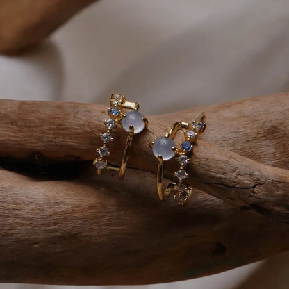 Elegant vintage-style opal earrings with a captivating play of light and a luxurious gold-plated finish