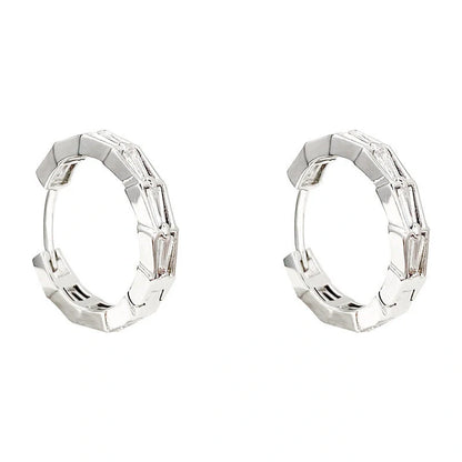 Elegant sterling silver drop earrings featuring sparkling zircon gemstones in a modern geometric design
