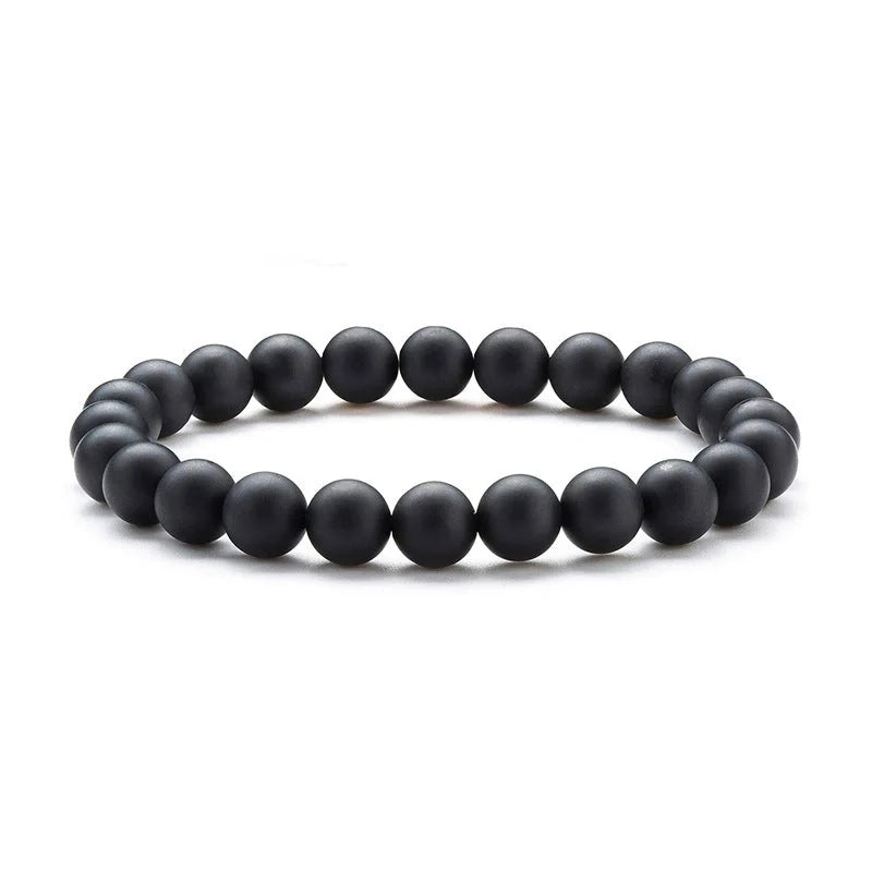 Natural Black Lava Rock and White Stone Stretch Bracelet showcasing unique natural stone beads