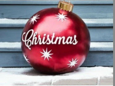Inflatable Christmas baubles in various festive designs for outdoor holiday decoration