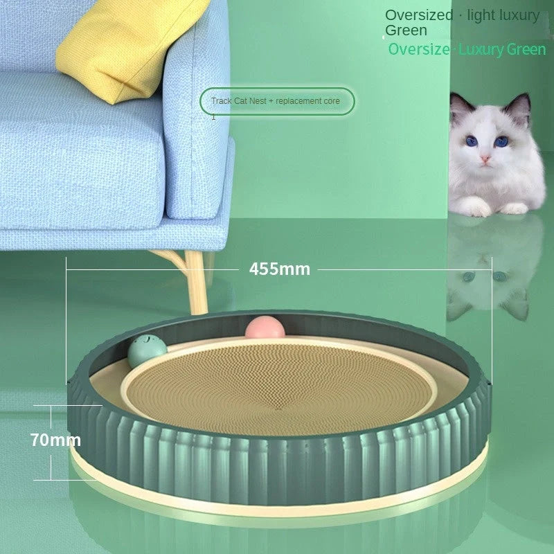 Round cat scratching board with toy ball, protects furniture from scratches