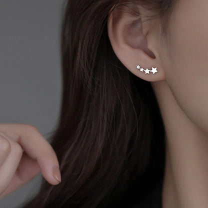 Geometric frosty style stud earrings in gold and silver, showcasing modern design and durability