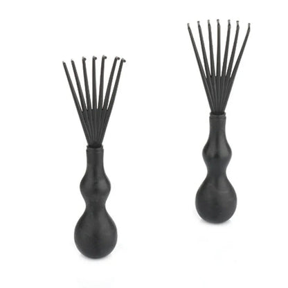 A premium hair brush with a sleek design, featuring soft bristles and a rounded massage function for healthy, detangled hair