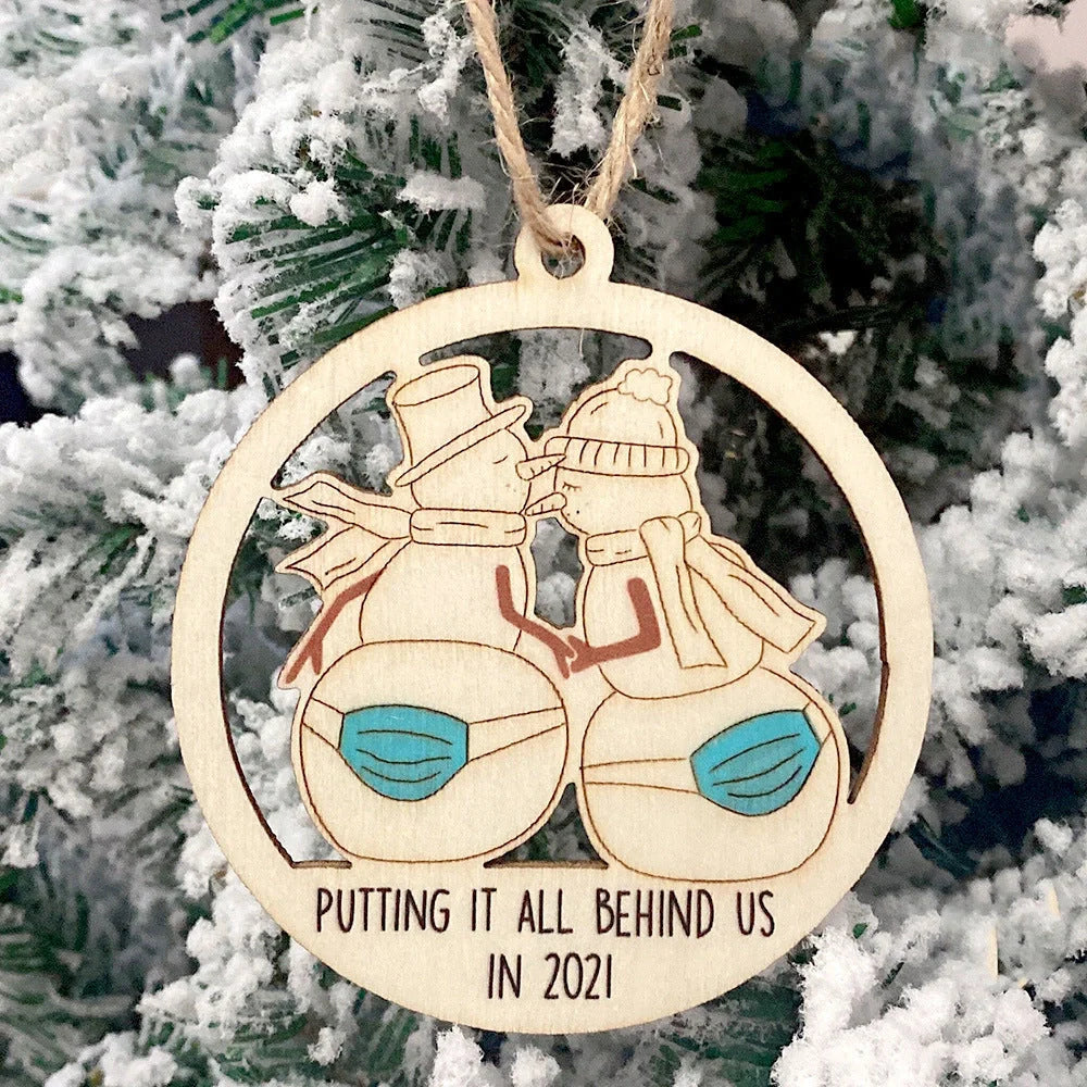 Wooden Hollowed-out Christmas Tree Pendant with snowman and deer design
