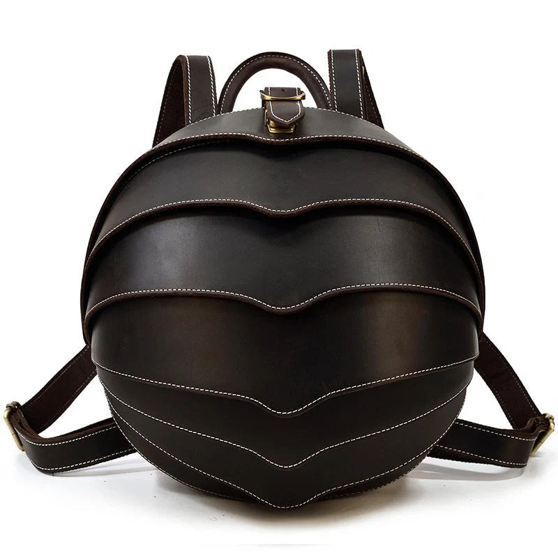 Vintage leather backpack in dark brown and black with multiple pockets