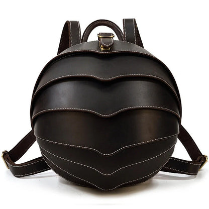 Vintage leather backpack in dark brown and black with multiple pockets