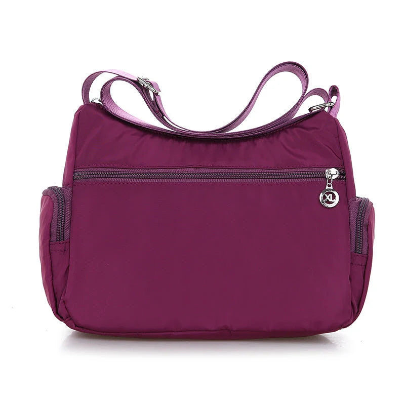 Ladies waterproof nylon oxford crossbody bag in various colors with multi-layer storage