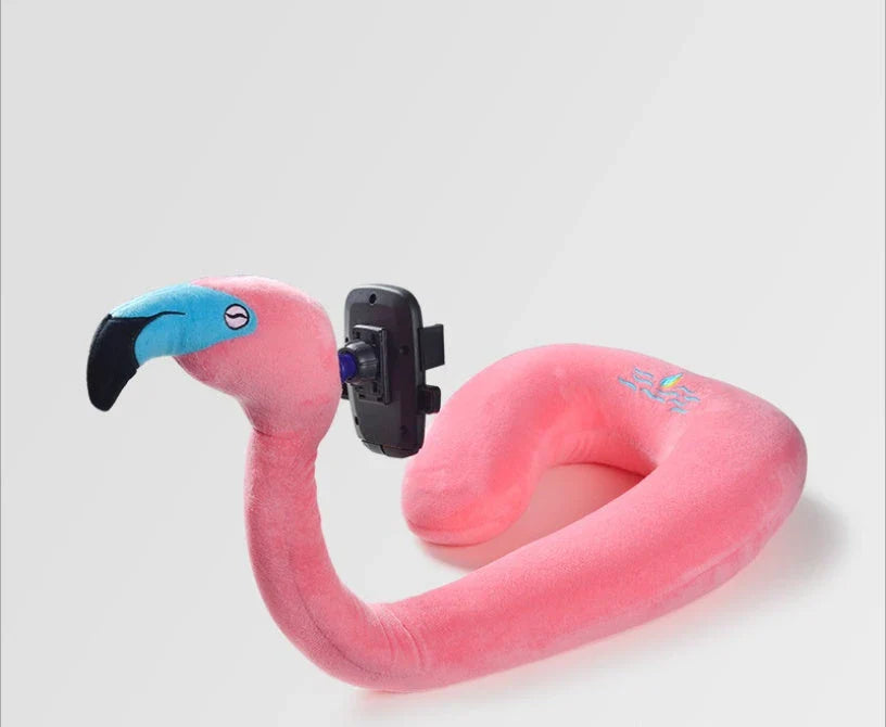 Cozy U-Shaped Pillow with Built-In Phone Holder in various colors, including Red Flamingo, Pink Unicorn, Orange Giraffe, Gray Snake, and Lagoon Dinosaur