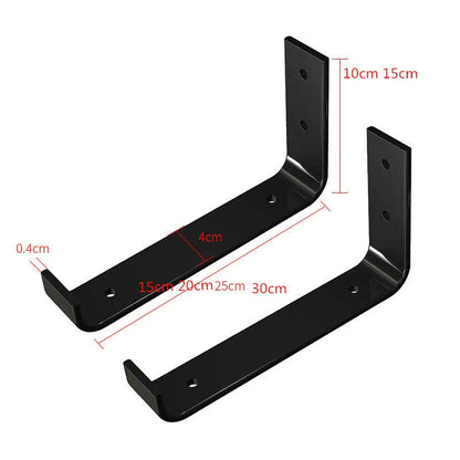 Sturdy black iron wall shelves in three sizes for displaying books, decor, and more in a rustic home setting
