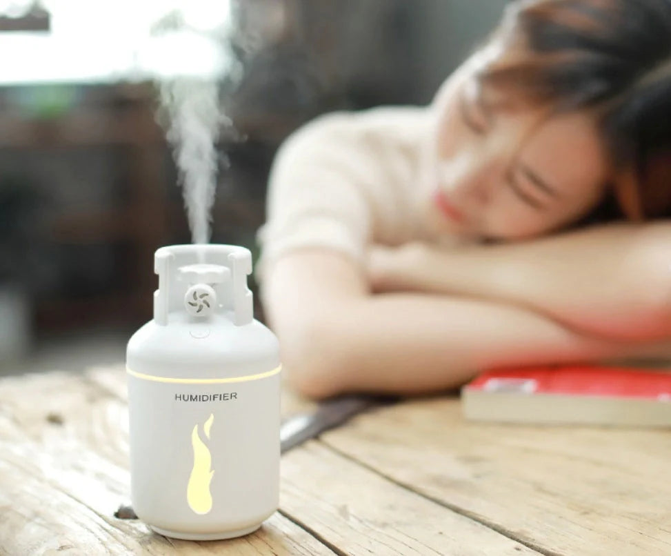 Multifunctional gas tank humidifier with USB connectivity in pink, blue, and white
